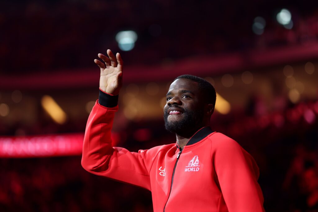 Frances Tiafoe of Team World acknowledges the crowd as Team World are introduced ahead of the evening session on day one of Laver Cup at Uber Arena.