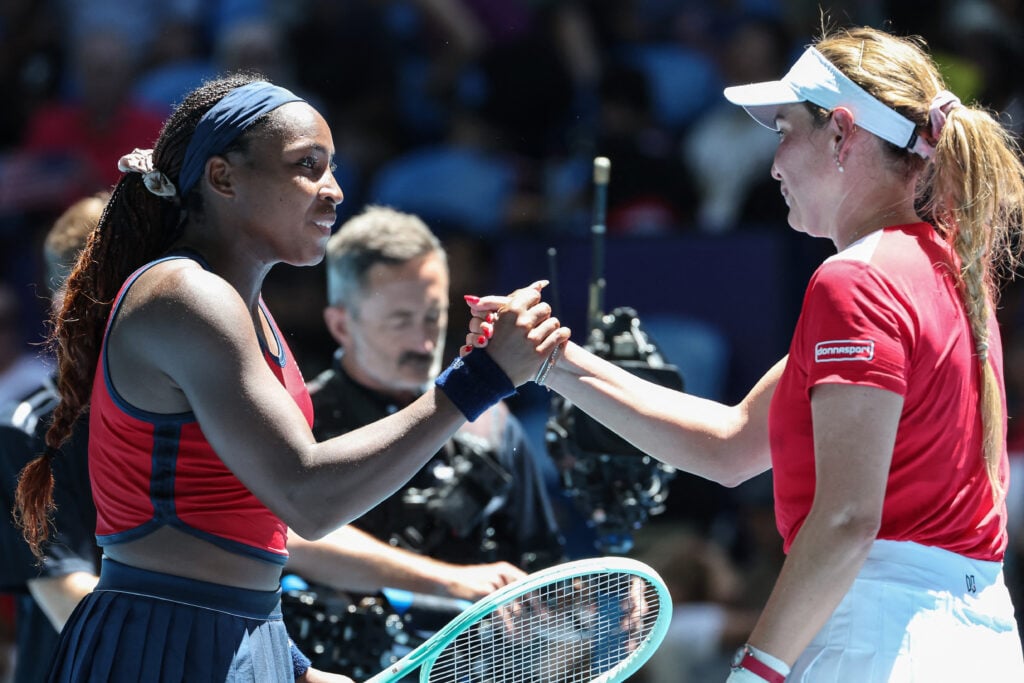 Coco Gauff (L) shakes hands with Donna Vekic after her victory during their women's singles match at the United Cup