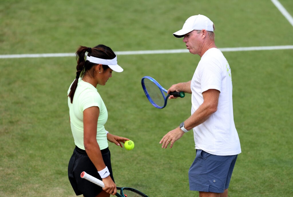 Mark Petchey and Emma Raducanu in conversation at the 2025 Wimbledon tournament