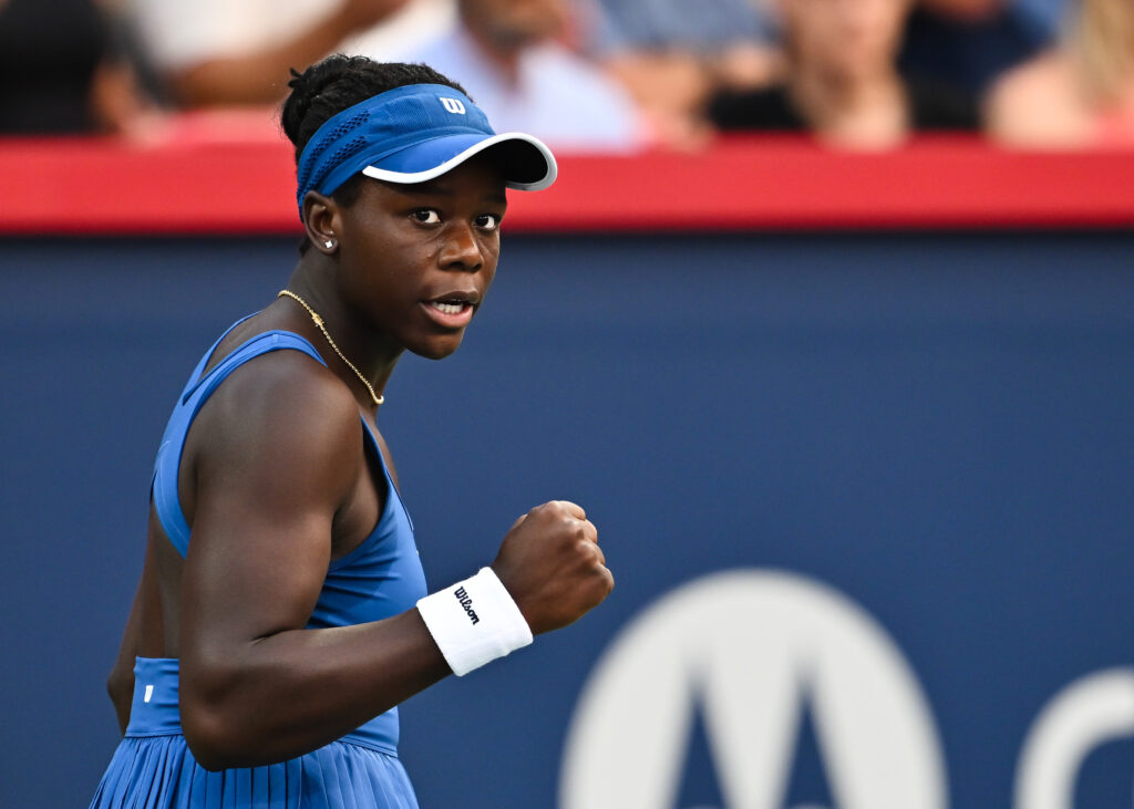 Victoria Mboko of Canada celebrates a point against Coco Gauff of the United States during their fourth round singles women's match on Day Seven of the WTA 1000 National Bank Open at IGA Stadium.