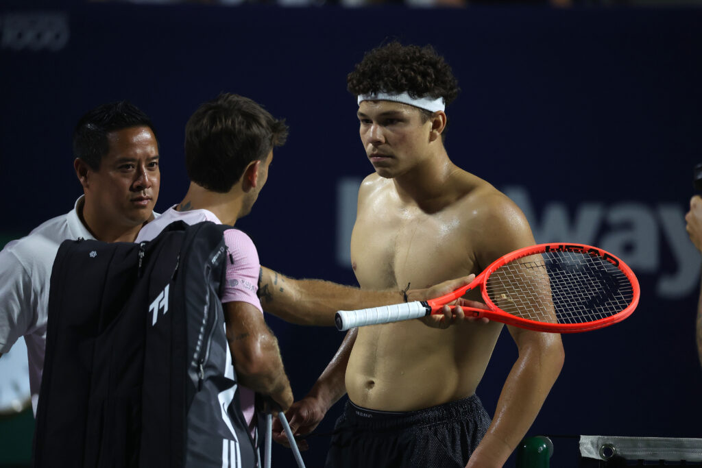 Ben Shelton of the United States and Flavio Cobolli of Italy discuss an aspect of the match after their game in the round of 16 on Centre Court at the National Bank Open at Sobeys Stadium in Toronto.
