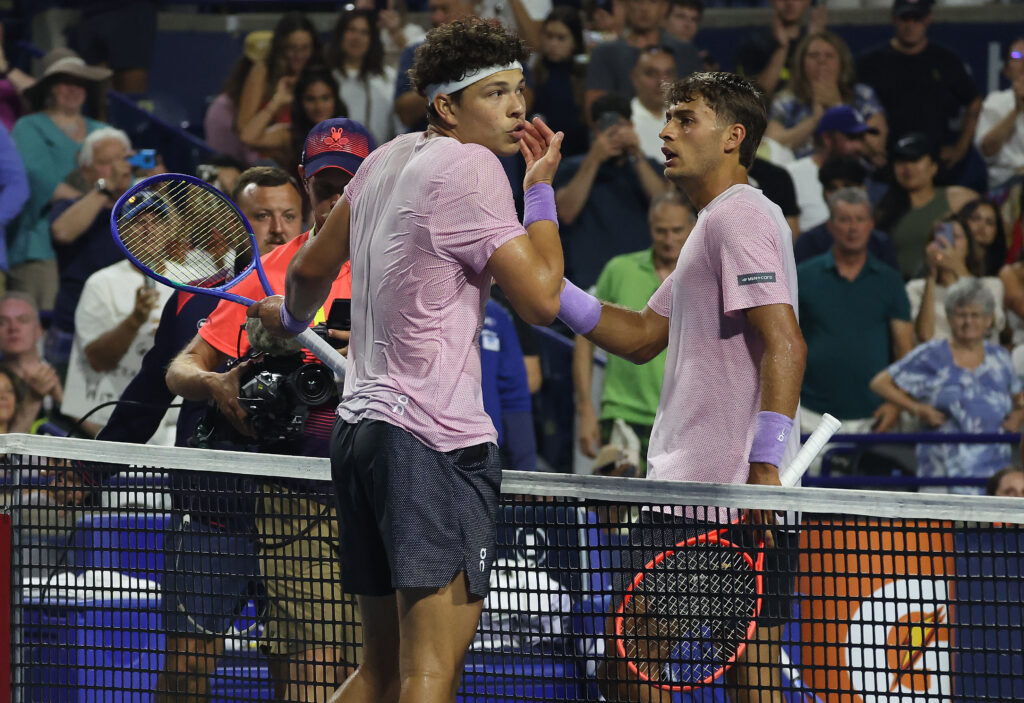 Ben Shelton and Flavio Cobolli meet at the net after their fourth-round match at the 2025 Canadian Open