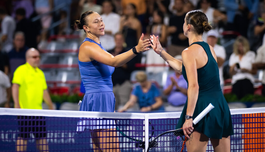 Amanda Anisimova of the United States and Elina Svitolina of Ukraine shake hands at the net after the fourth round of the National Bank Open at Stade IGA.