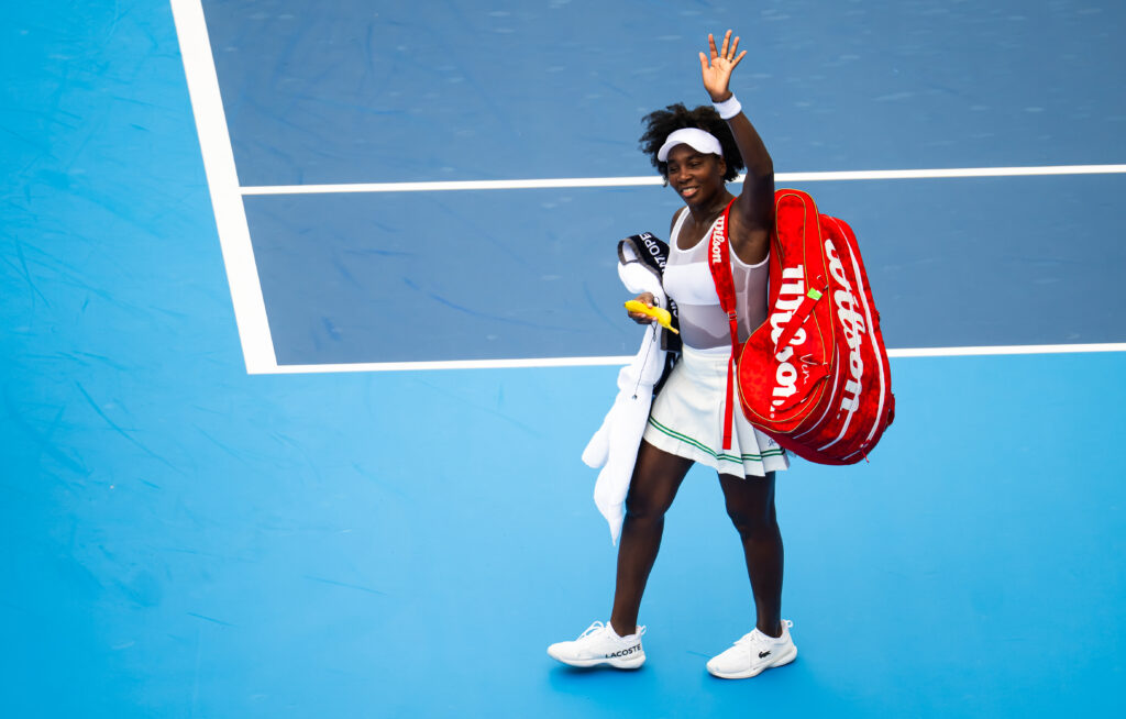 Venus Williams waves goodbye to the crowd after her first-round loss in Cincinnati