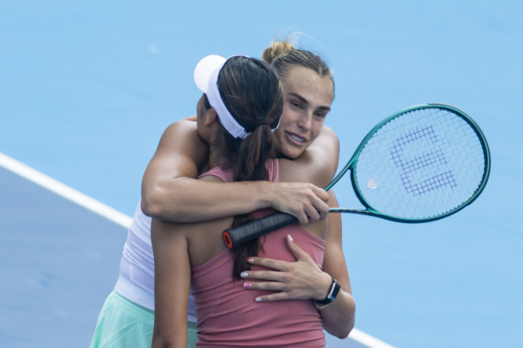 Aryna Sabalenka and Emma Raducanu embrace after their second-round match at the 2025 Cincinnati Open