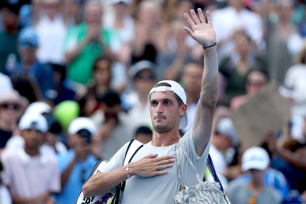 Terence Atmane of France leaves the court after his match against Jannik Sinner of Italy during the semifinals of the Cincinnati Open at Lindner Family Tennis Center.