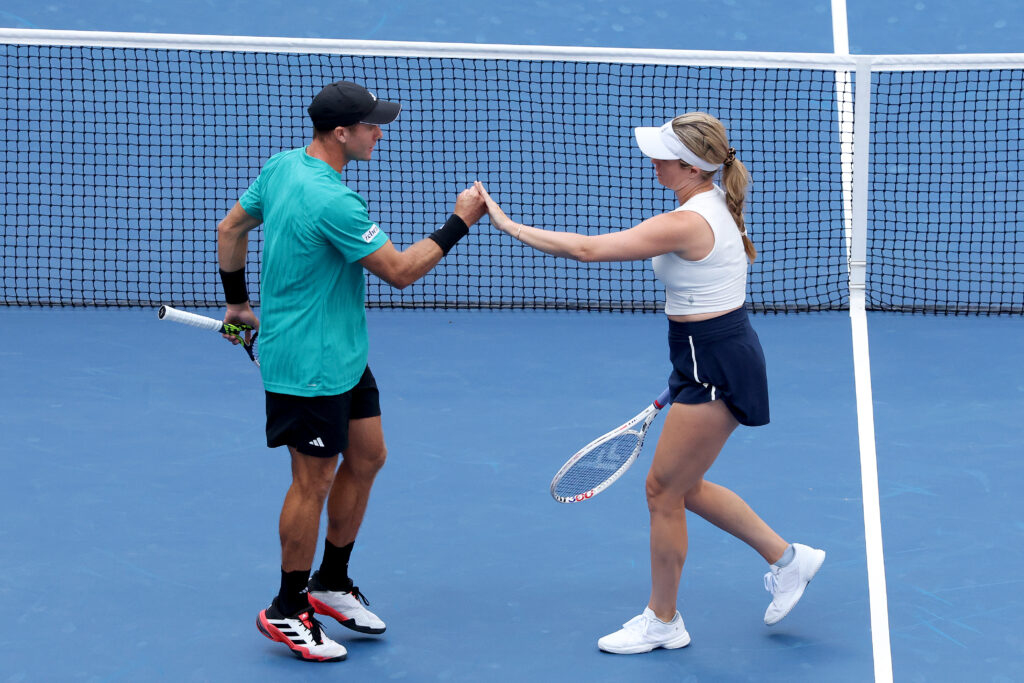 Danielle Collins celebrates a point with Christian Harrison at the 2025 US Open