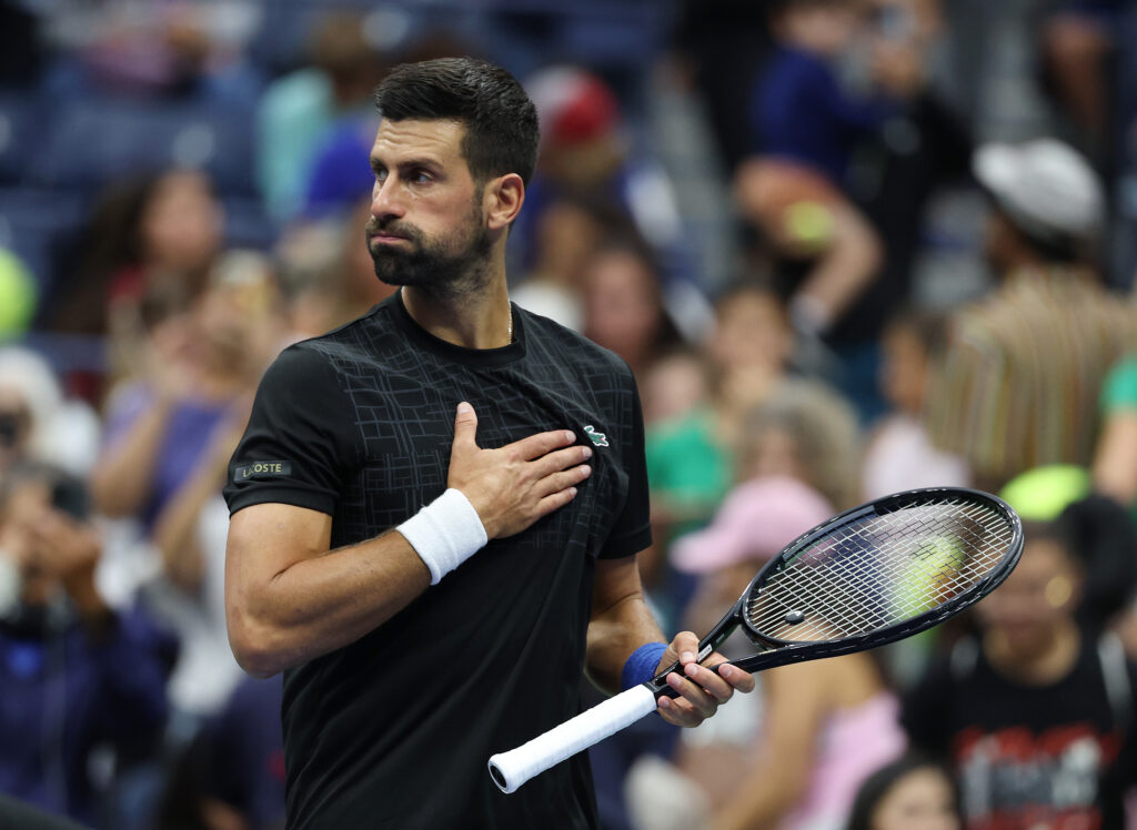 Novak Djokovic reacts during the 2025 US Open mixed doubles event.