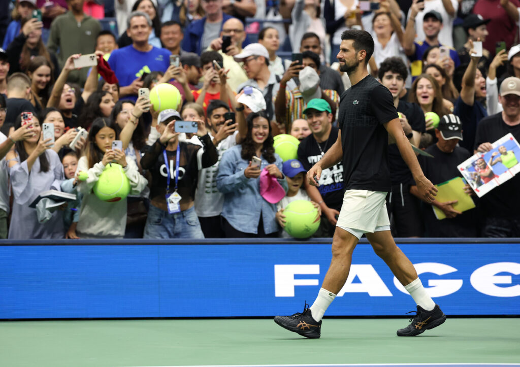 Novak Djokovic in action at the 2025 US Open mixed doubles event.