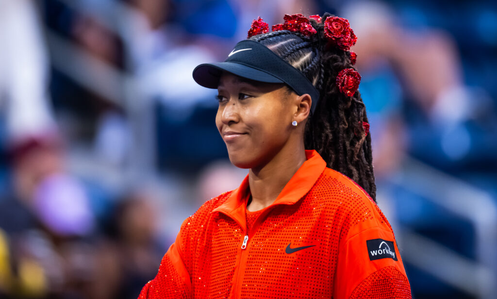 Naomi Osaka walks on court for her first-round match at the 2025 US Open
