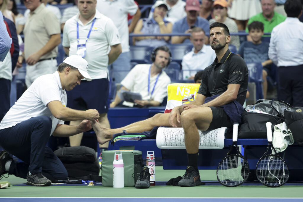 Novak Djokovic receives treatment in his 2025 US Open first round match