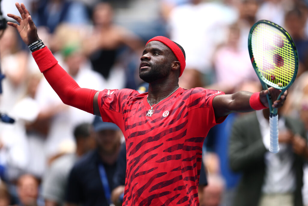 Frances Tiafoe of the United States reacts on against Yoshihito Nishioka of Japan during their Men's Singles First Round match on Day Two of the 2025 US Open at USTA Billie Jean King National Tennis Center.