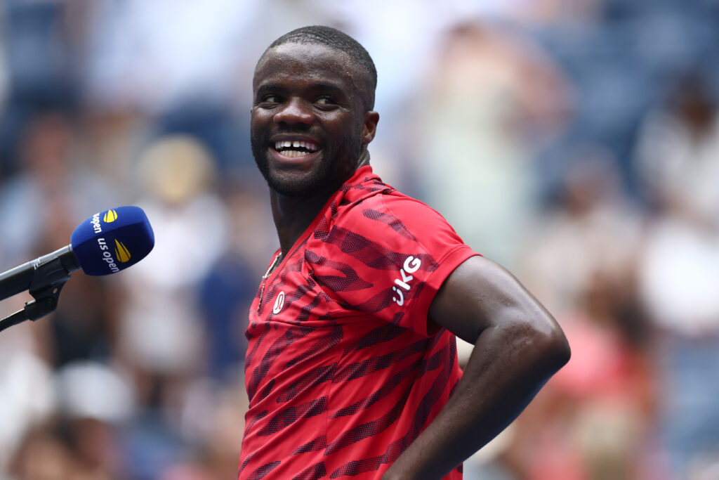 Frances Tiafoe of the United States reacts against Yoshihito Nishioka of Japan during their Men's Singles First Round match on Day Two of the 2025 US Open at USTA Billie Jean King National Tennis Center.