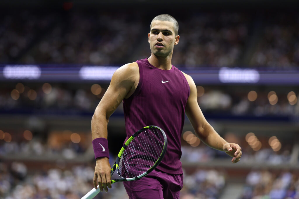 Carlos Alcaraz of Spain reacts against Reilly Opelka of the United States during their Men's Singles First Round match on Day Two of the 2025 US Open at USTA Billie Jean King National Tennis Center.