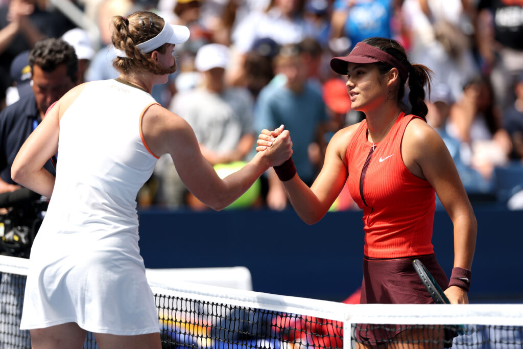 Emma Raducanu and Elena Rybakina shake hands after their match at the US Open.