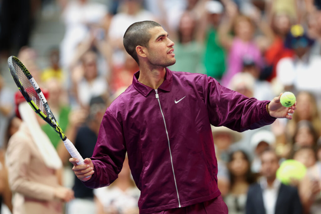 Carlos Alcaraz reacts after beating Luciano Darderi at the 2025 US Open