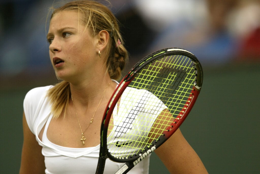 Maria Sharapova reacts during her defeat to Monica Seles at the 2002 Pan Pacific Open