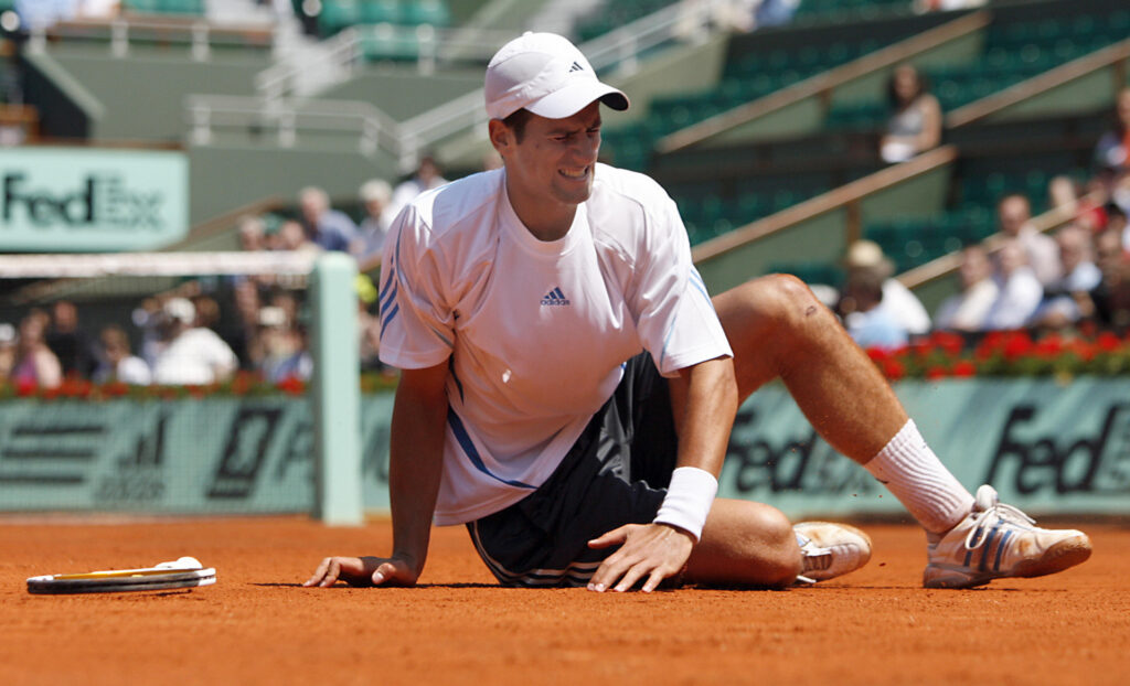 Novak Djokovic grimacing at Roland Garros in 2006.