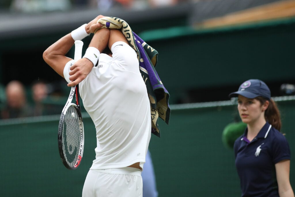 Novak Djokovic feels his elbow at Wimbledon 2017