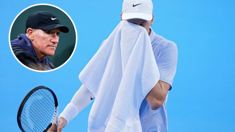 Jannik Sinner of Italy uses a towel during the match against Gabriel Diallo of Canada during Day 5 of the Cincinnati Open at the Lindner Family Ten...