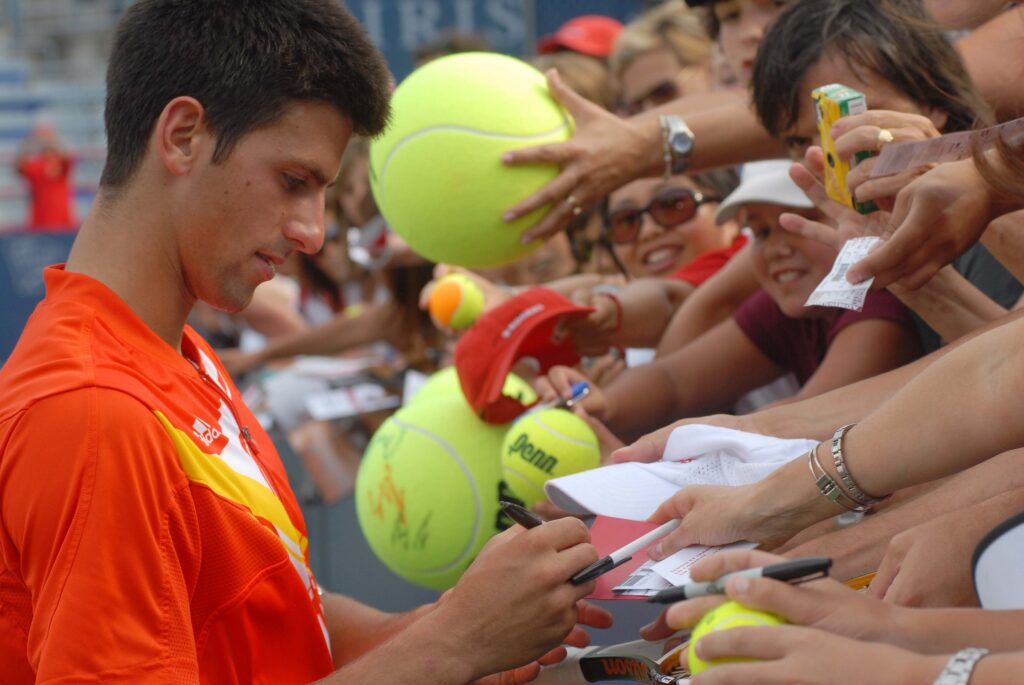 Novak Djokovic engaging with fans at the Canadian Open in 2007.