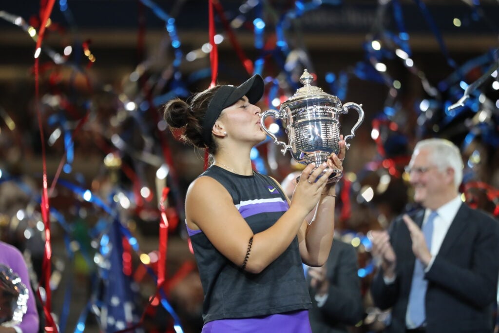 Bianca Andreescu of Canada poses with the championship trophy after winning the Women's Singles final match against Serena Williams of the United States on day thirteen of the 2019 US Open at the USTA Billie Jean King National Tennis Center.