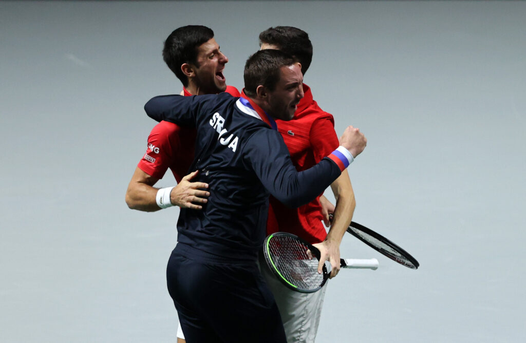 Viktor Troicki celebrating with Novak Djokovic at the 2021 Davis Cup