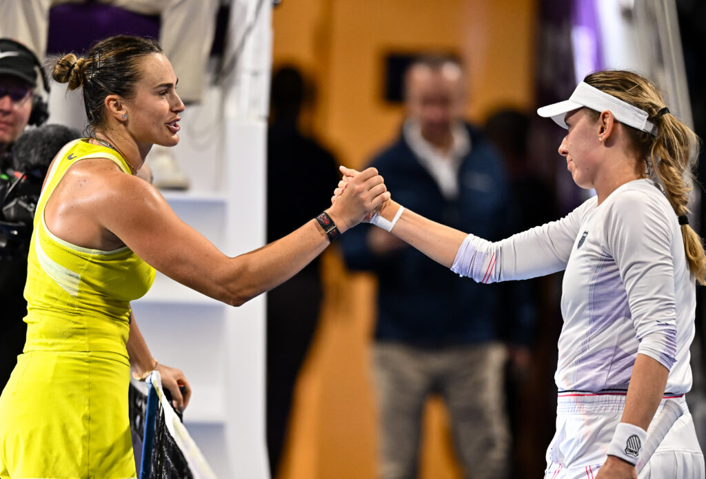 Aryna Sabalenka and Ekaterina Alexandrova shaking hands after their clash in Doha.