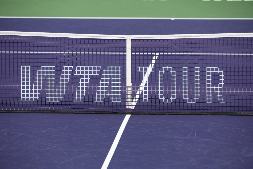 An image of the WTA logo picture on a net at Indian Wells in 2025