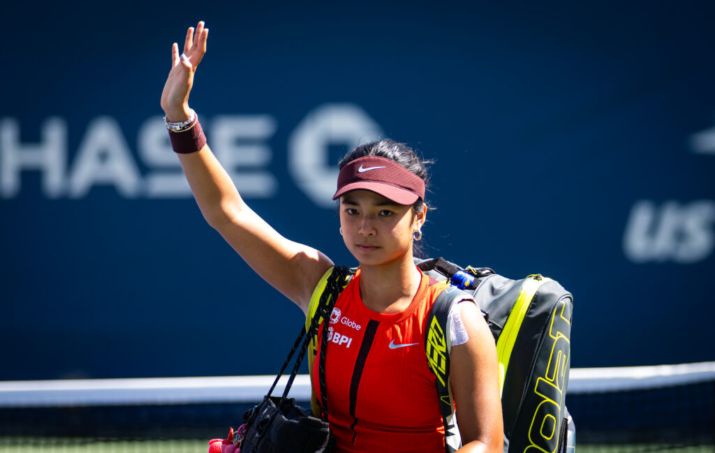 Alexandra Eala waves goodbye to the US Open crowd.