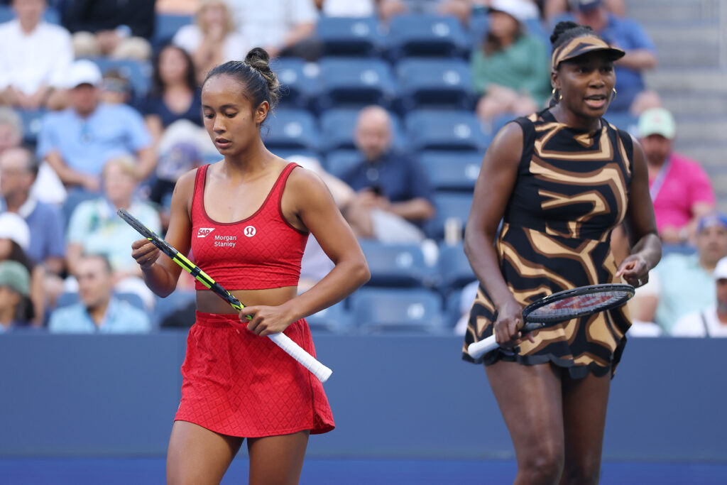 Leylah Fernandez and Venus Williams look on during the 2025 US Open doubles tournament