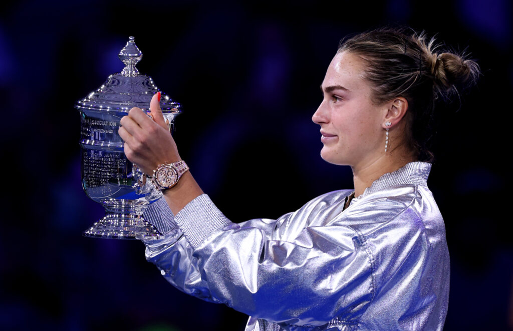 Aryna Sabalenka poses with her trophy after defeating Amanda Anisimova of the United States during their Women's Singles Final match on Day Fourteen of the 2025 US Open at USTA Billie Jean King National Tennis Center.