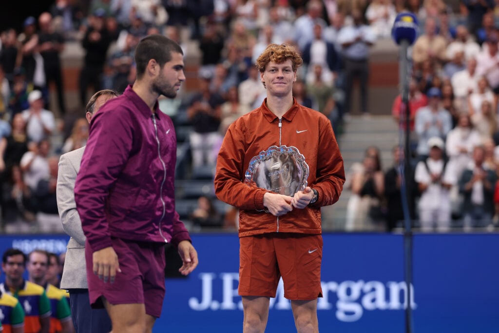 Jannik Sinner and Carlos Alcaraz at the 2025 US Open men's singles final award ceremony.