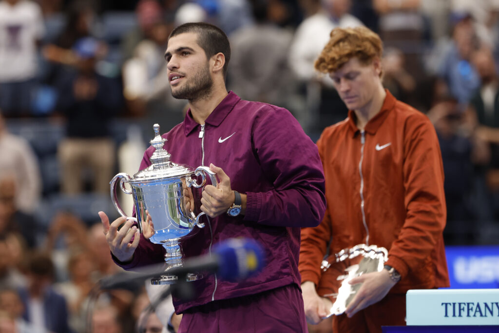 Carlos Alcaraz of Spain, finalist Jannik Sinner of Italy during the podium ceremony following the Men's Singles Final match on day fifteen of the 2025 US Open Tennis Championships at USTA Billie Jean King National Tennis Center.