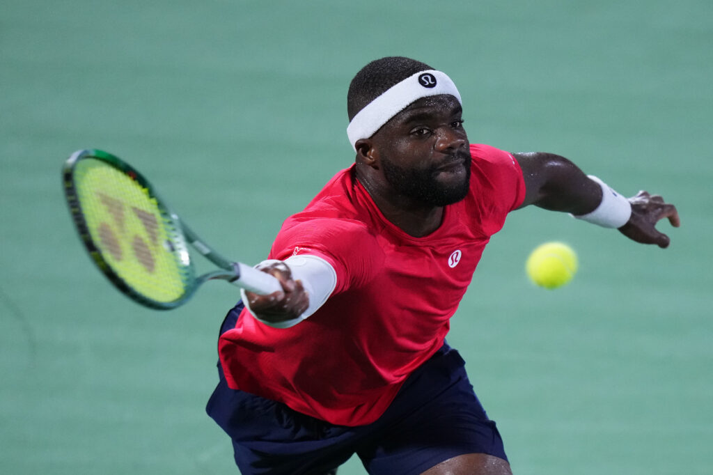 Frances Tiafoe of Team USA returns a shot against Jakub Mensik of Team Czechia during the 2025 Davis Cup Qualifier second round match between USA and Czechia at Delray Beach Tennis Center.