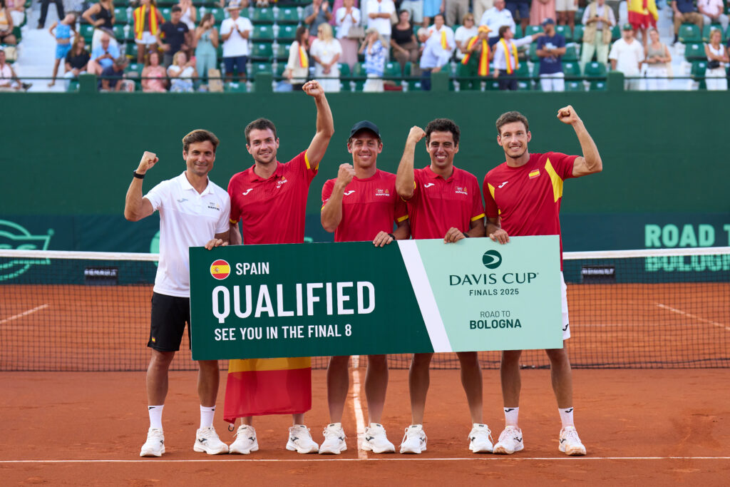 David Ferrer, Pedro Martinez, Roberto Carballes Baena, Jaume Munar and Pablo Carreño Busta of Spain celebrate with banner "Qualified" after winning the 2025 Davis Cup Qualifier second round match between Spain and Denmark at Club de Tenis Puente Romano.