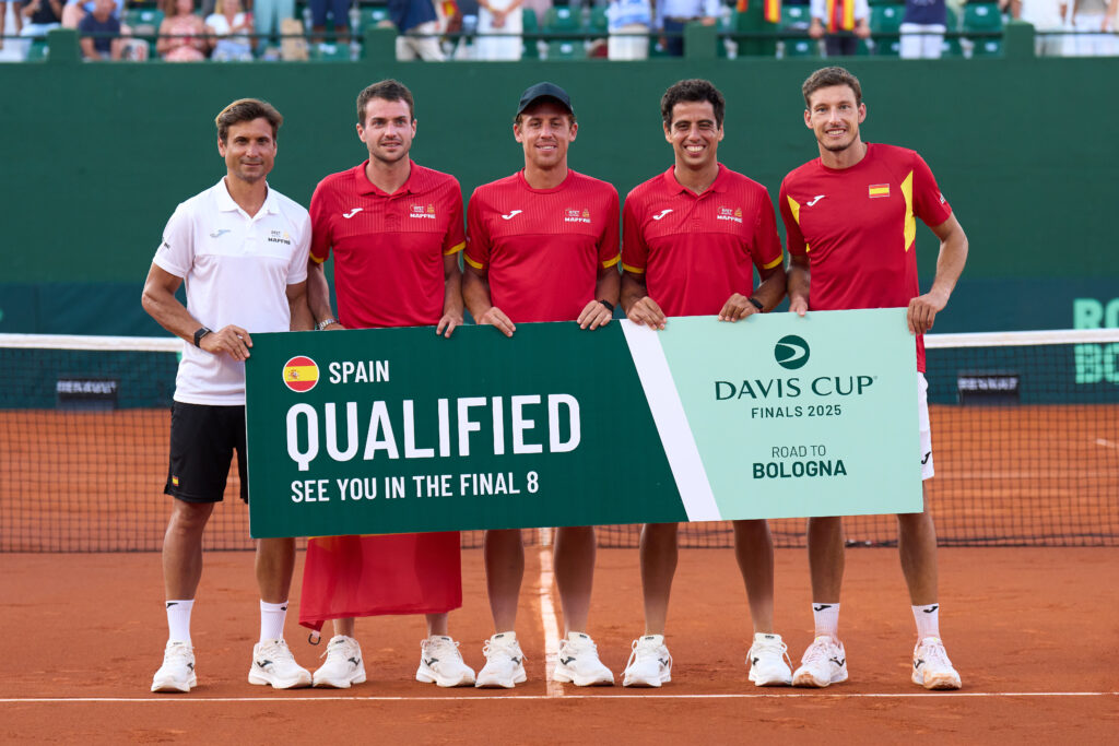 David Ferrer, Pedro Martinez, Roberto Carballes Baena, Jaume Munar and Pablo Carreño Busta of Spain celebrate with banner "Qualified" after winning the 2025 Davis Cup Qualifier second round match between Spain and Denmark at Club de Tenis Puente Romano.