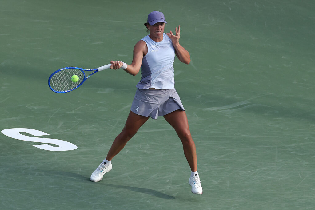 Iga Swiatek hits a forehand at the 2025 Korea Open