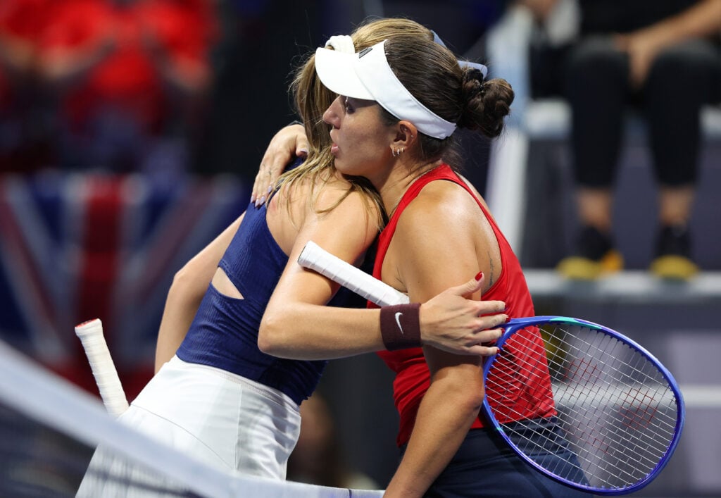 Katie Boutler and Jessica Pegula meet at the net after their clash at the Billie Jean King Cup.