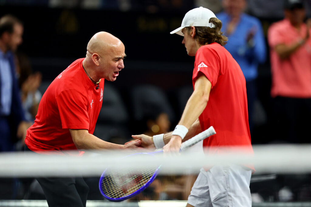 Team World Captain Andre Agassi and Alex De Minaur of Team World celebrate after defeating Alexander Zverev of Team Europe during day two of Laver Cup 2025 at Chase Center.