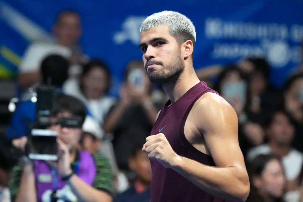 Carlos Alcaraz celebrates winning his first-round match at the 2025 Japan Open