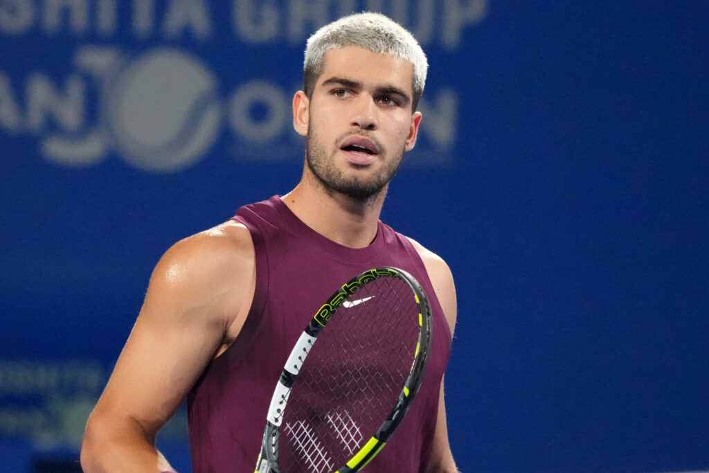 Carlos Alcaraz celebrates during his win over Sebastian Baez at the 2025 Japan Open