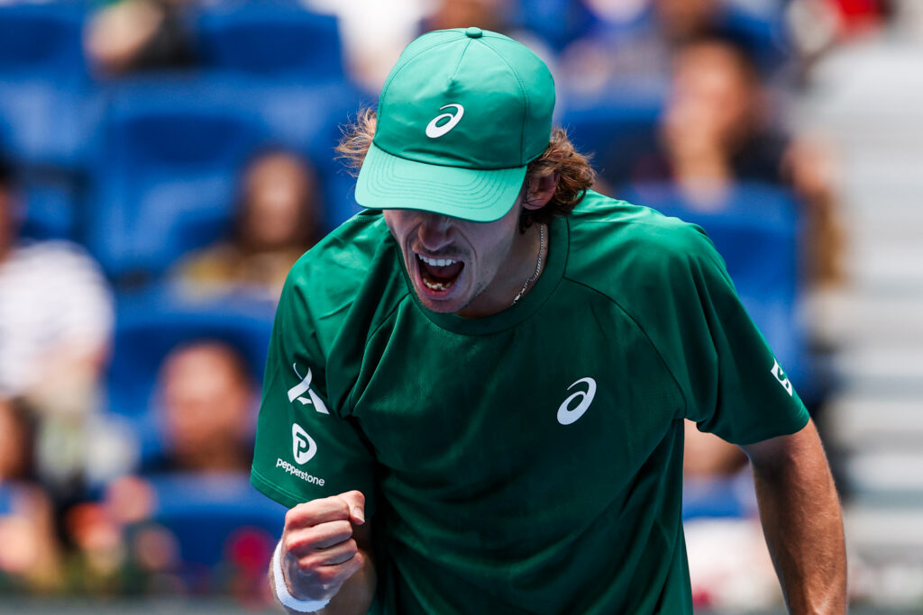 Alex de Minaur reacts during his match with Yunchaokete Bu at the China Open.