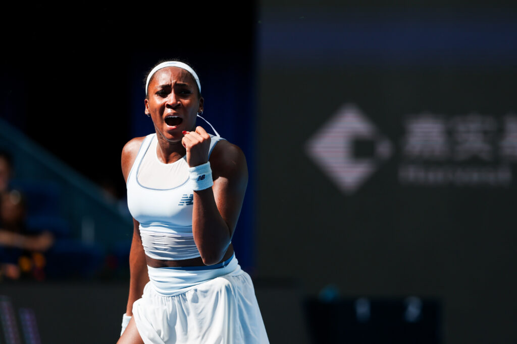 Coco Gauff roars after winning a point at the China Open.