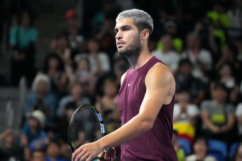 Carlos Alcaraz looks on at the 2025 Japan Open.