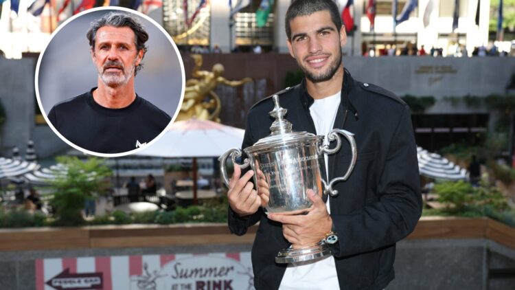 Carlos Alcaraz of Spain poses for a photo overlooking Rockefeller Plaza with the Men's Singles trophy following his victory over Jannik Sinner of I...