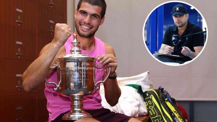 Carlos Alcaraz of Spain poses with his trophy in the locker room after defeating Jannik Sinner of Italy during their Men's Singles Final match on D...