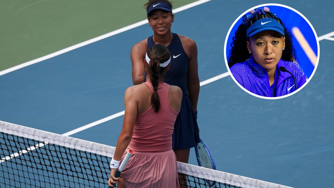 Emma Raducanu of the United Kingdom shakes hands with Naomi Osaka of Japan after winning a women's singles match during on day 4 of the Mubadala Ci...