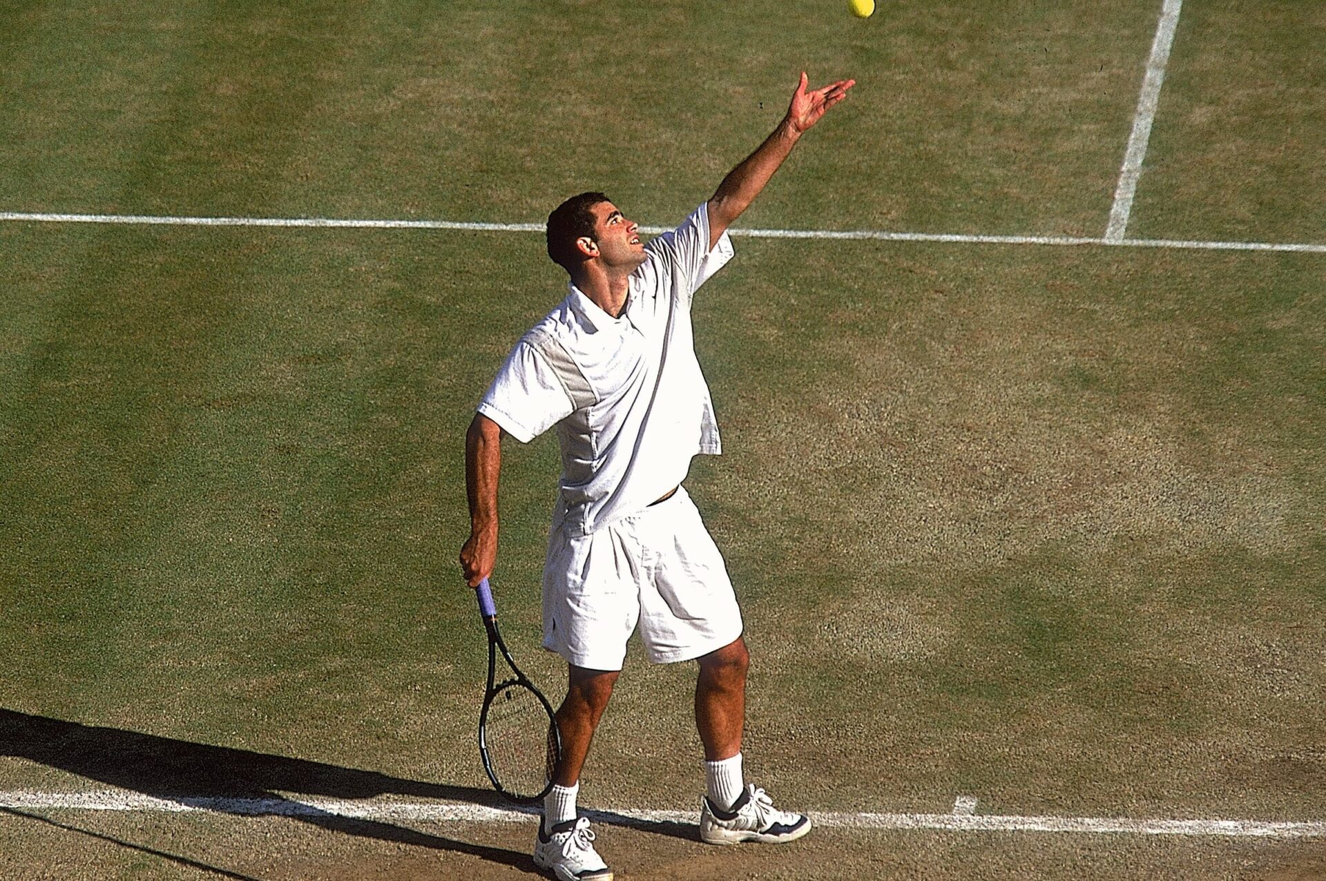 Pete Sampras serves during the 2000 Wimbledon semifinals