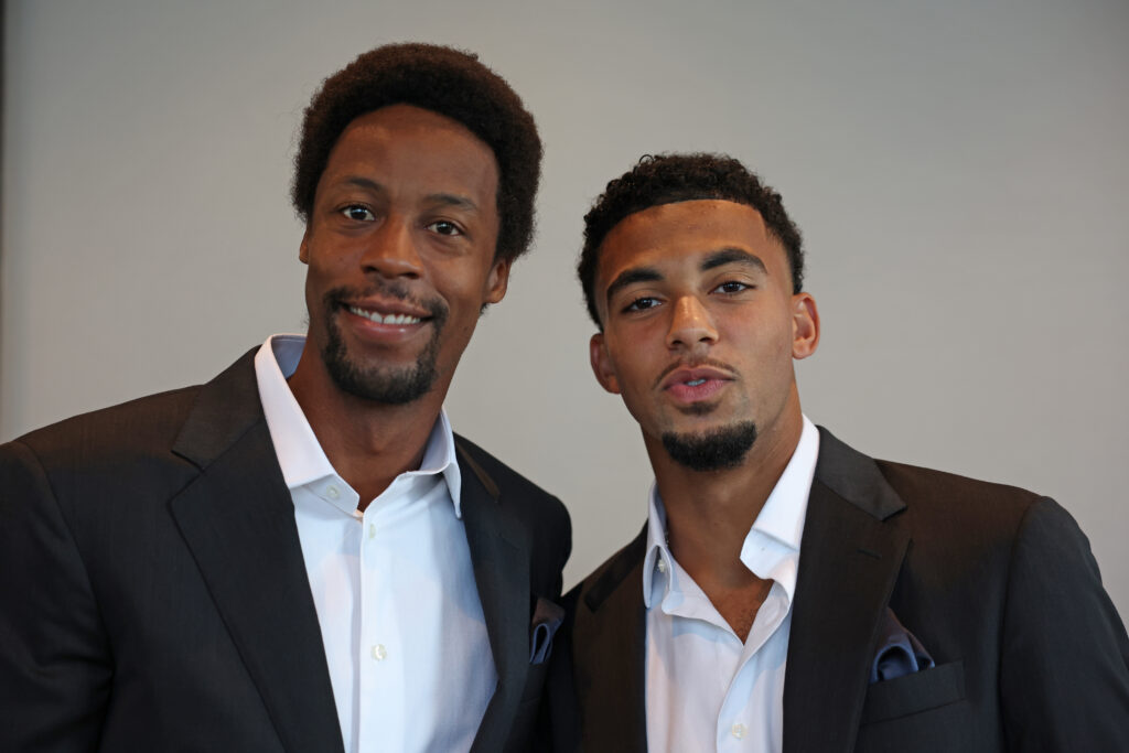 Gael Monfils of Team Europe and Felix Auger-Aliassime of Team World pose for a picture prior to a team photo shoot ahead of the Laver Cup at Rogers Arena.